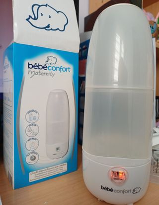 Calienta bibis + carrusel cuna + saca leches manua