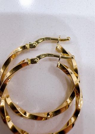 Orecchini cerchio intrecciati in oro 18kt 750