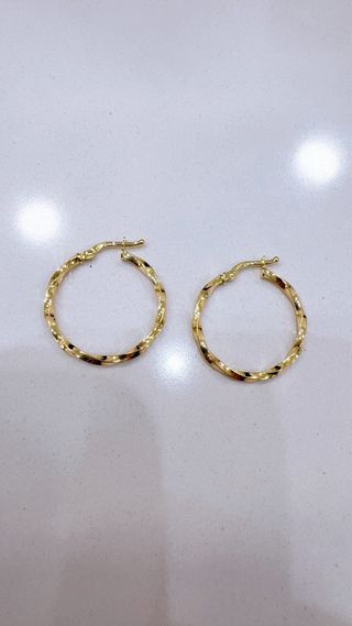Orecchini cerchio intrecciati in oro 18kt 750
