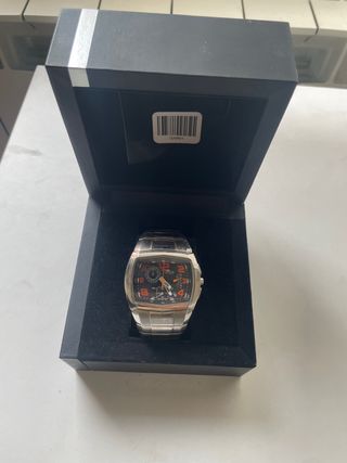 Reloj Lotus Plata y Naranja