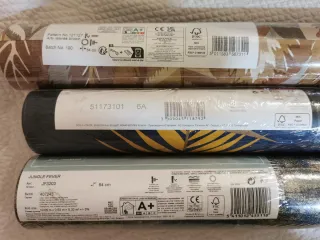 Rolos de papel de parede decorativo