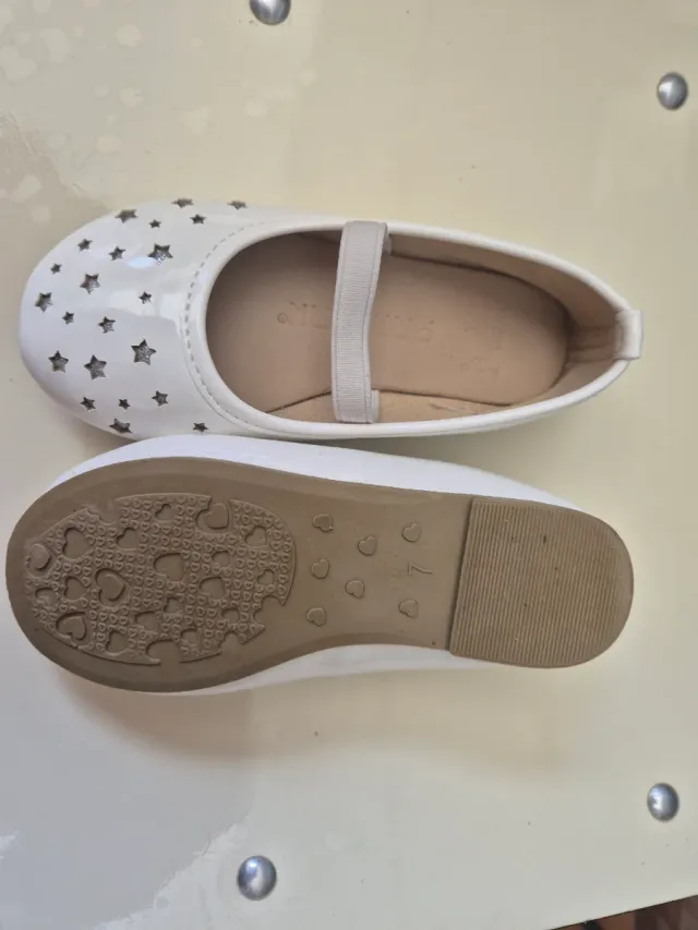 Zapatitos blancos niña estrellas