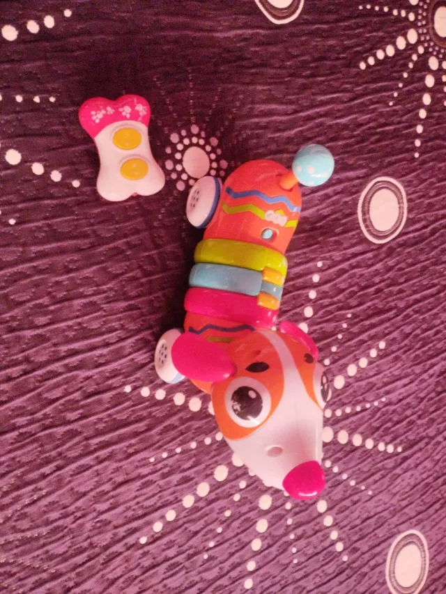 Juguete perro interactivo y hueso