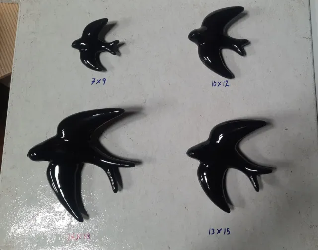 Juego de 4 golondrinas de cerámica