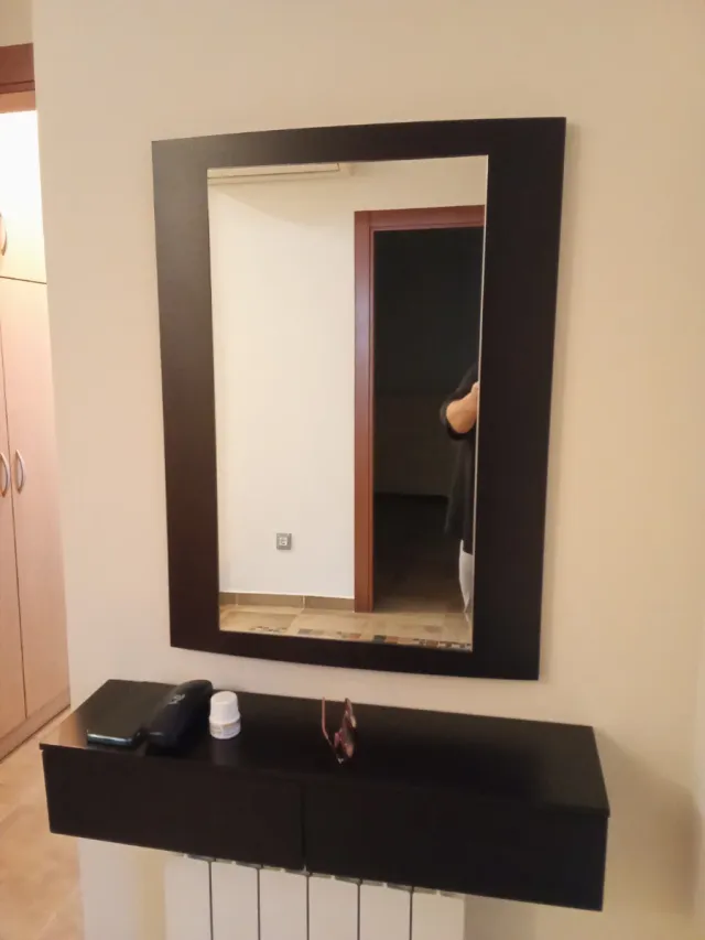 Recibidor moderno madera y cristal