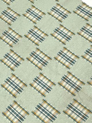 Alfombra verde con cuadros