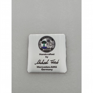 EMBLEMA MERCEDES AMG MICHAEL FEEST plata logo en