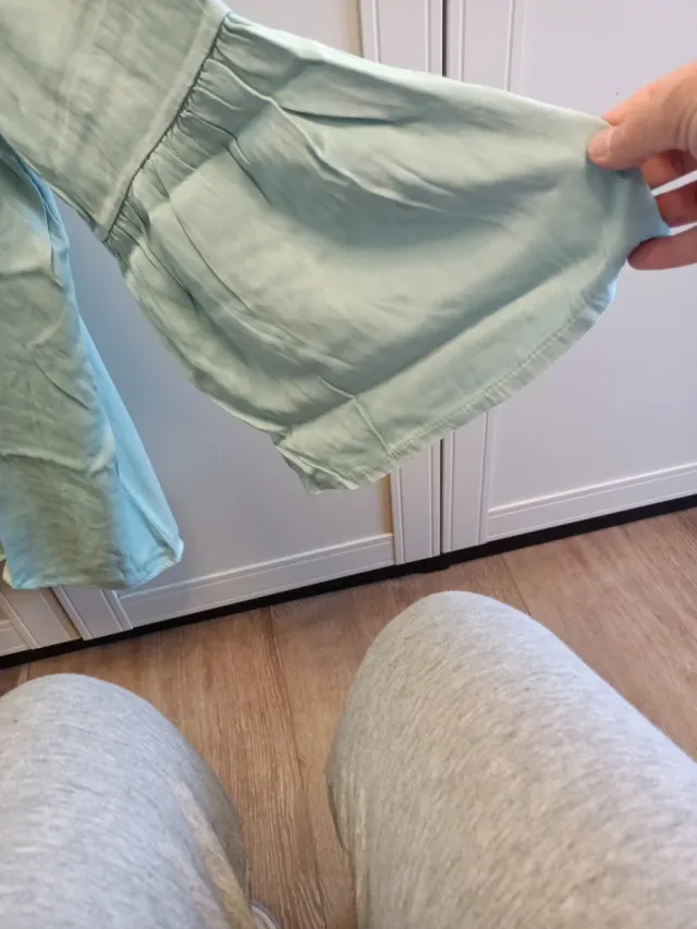 Blusón satinado delantero