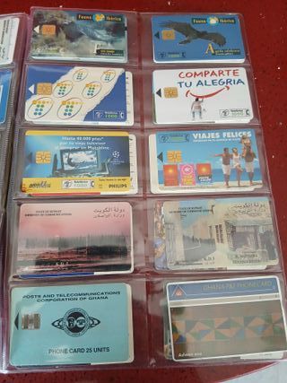 60 schede telefoniche World con fogli H46