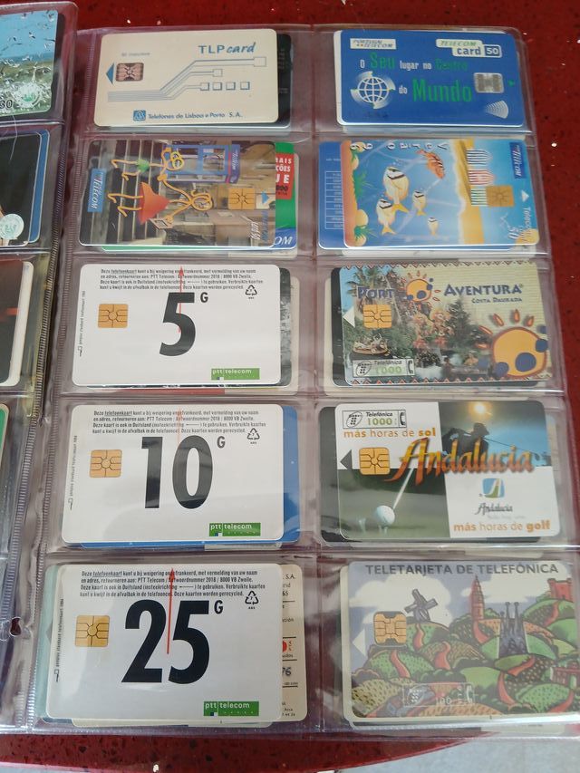 60 schede telefoniche World con fogli H46