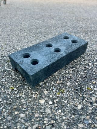 Base de caucho para valla de obra