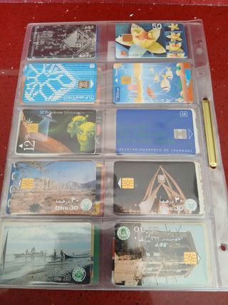 60 schede telefoniche World con fogli H45