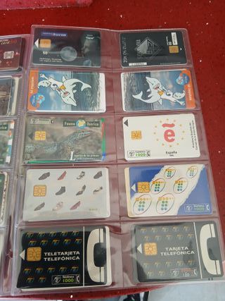 60 schede telefoniche World con fogli H45