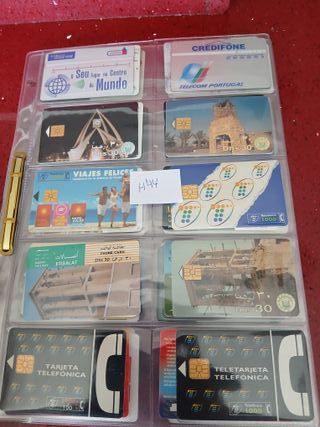 60 schede telefoniche World con fogli H44