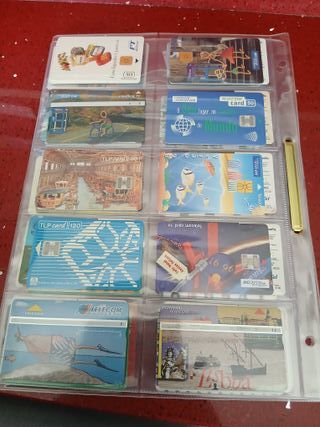 60 schede telefoniche World con fogli H44