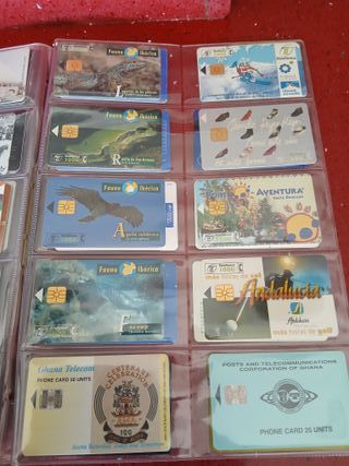 60 schede telefoniche World con fogli H44