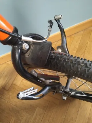 Bicicleta Btwin naranja frenos para arreglar