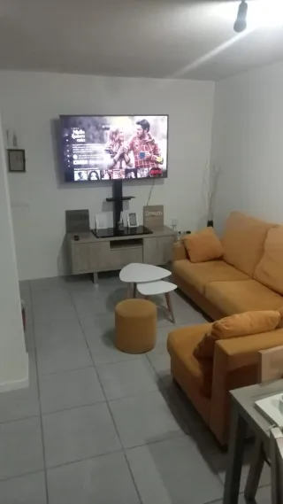 Sofá chaise lounge amarillo tela