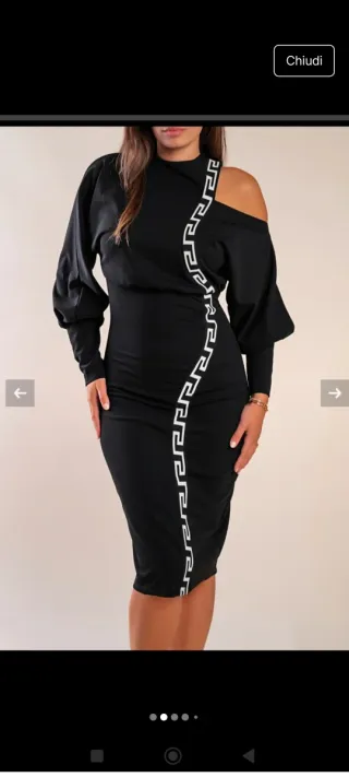 Abito nero elegante con dettaglio geometrico