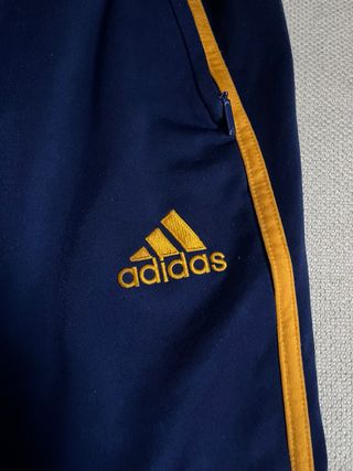 Pantalón Adidas azul y dorado