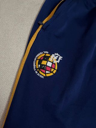 Pantalón Adidas azul y dorado