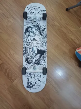 Monopatín Oxelo Diseño Calaveras
