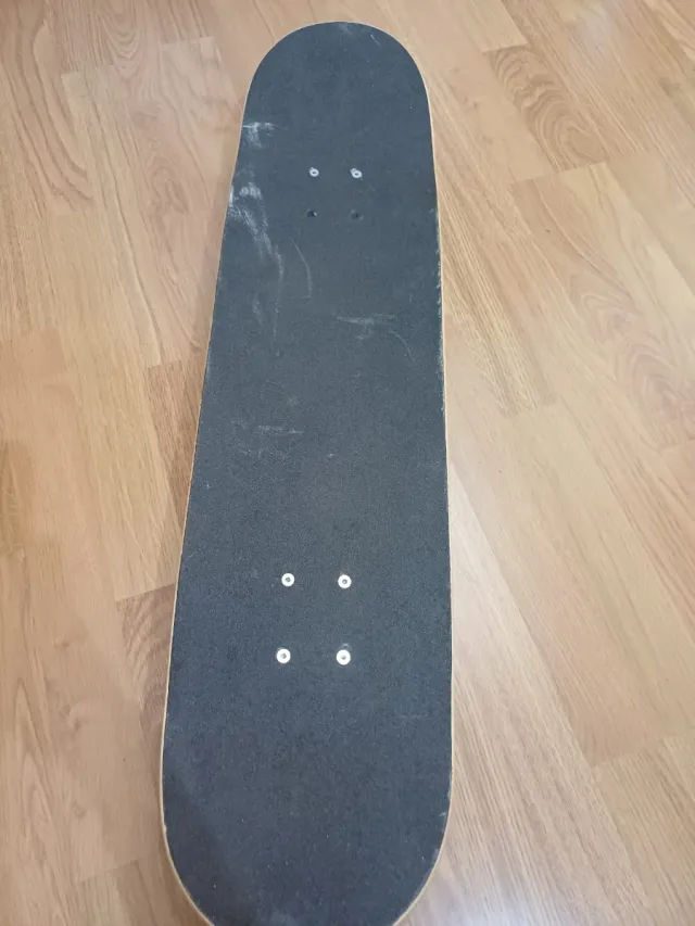 Monopatín Oxelo Diseño Calaveras