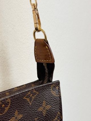 Pochette Louis Vuitton Monogram Marrón y Dorado