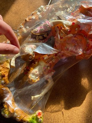 Oggetto decorativo con figure indiane