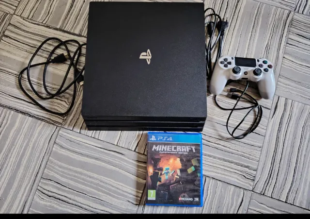 PS4 Pro 1TB + Mando Blanco+ cables+ juego