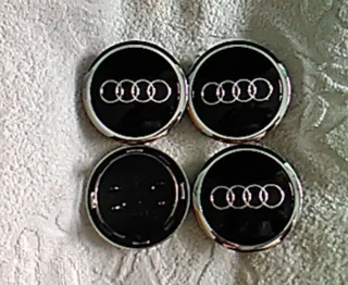 Tapabujes centro rueda llanta Audi negro 69mm logo