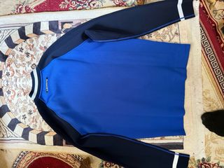 Chaqueta deportiva Lacoste azul y negra