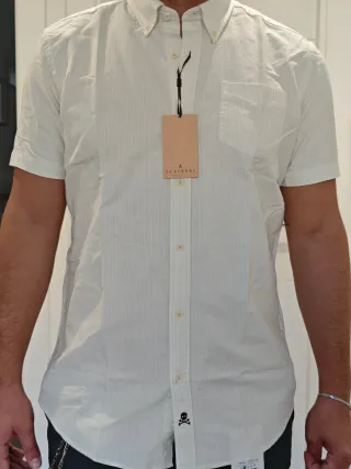 Camisa Scalpers rayas blancas y celeste