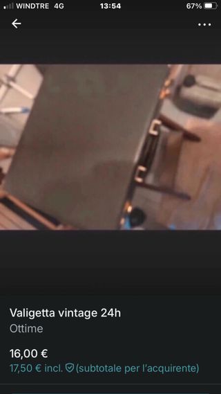 Valigetta 24h vintage nera con serrature oro