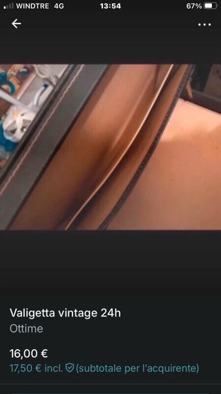 Valigetta 24h vintage nera con serrature oro