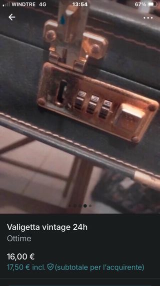 Valigetta 24h vintage nera con serrature oro