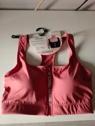 Top deportivo Ouno rosa con cremallera