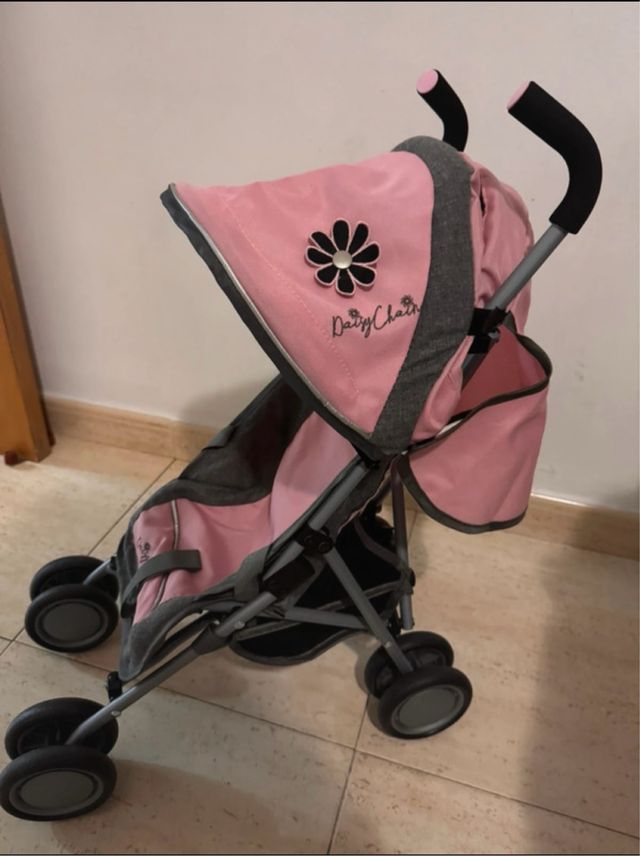 Carro de muñecas rosa