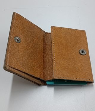 Mini cartera-monedero de cuero
9x6 cm