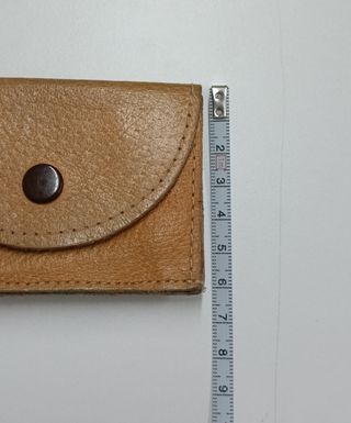 Mini cartera-monedero de cuero
9x6 cm