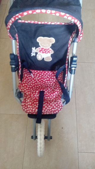 Carrito de juguete con osito y flores