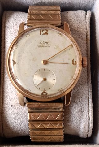 Reloj Dogma Dorado y Blanco