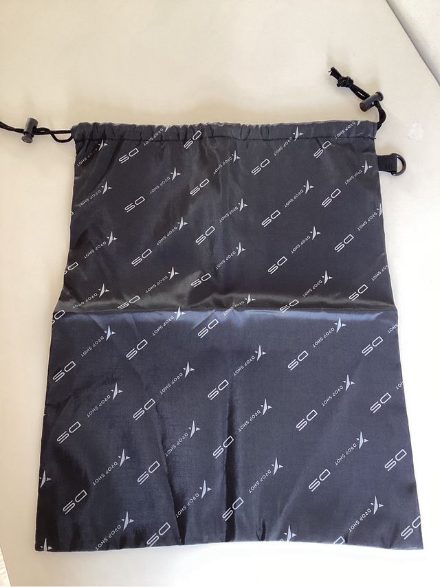 Chaqueta deportiva y bolsa Drop Shot negra