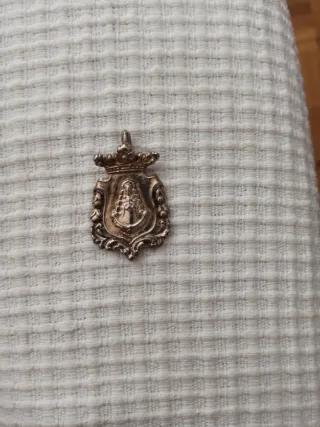 Medalla Virgen del Rocío plateada. 