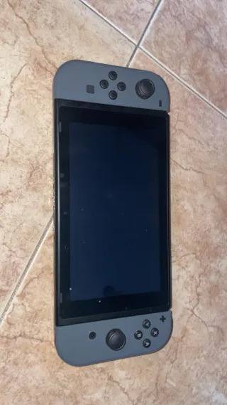 Nintendo Switch + 3 giochi + accessori