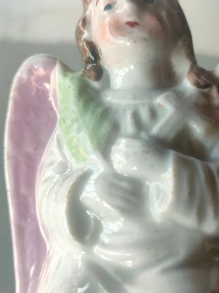Antico angelo in biscuit lucido