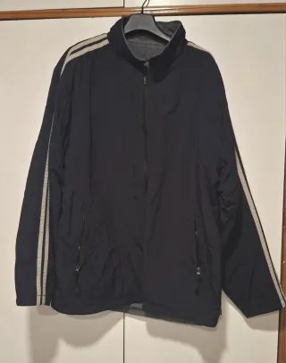 Parka reversible azul marino con rayas