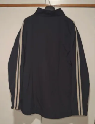 Parka reversible azul marino con rayas