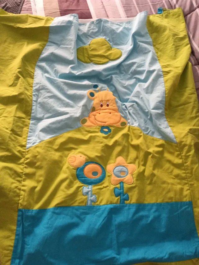 Edredón cuna jirafa y flores