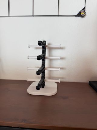 Estante para gafas de sol negro y blanco